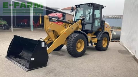 2023 Caterpillar 908 wheel loader, front three-quarter view 2023 Caterpillar 908 wheel loader, front three-quarter view