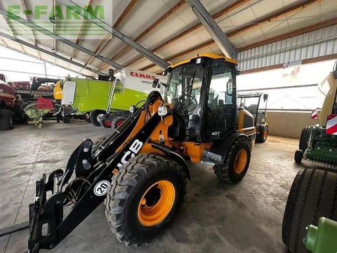 2023 JCB 407 AGRI wheel loader, front three-quarter view 2023 JCB 407 AGRI wheel loader, front three-quarter view