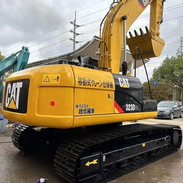 2023 Caterpillar 323D2L crawler excavator, rear three-quarter view