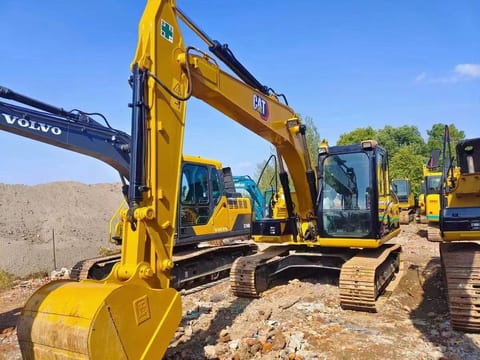 2020 Caterpillar 313D crawler excavator, front three-quarter view