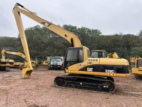 Caterpillar 320CL rupsgraafmachine uit 2018, zijaanzicht