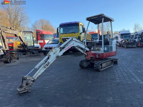 2009 Takeuchi TB014 mini excavator, side view