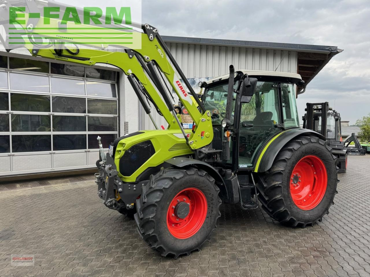 Farm tractor CLAAS axos 240